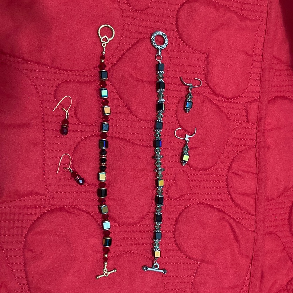 Two toggle bracelets with matching earrings